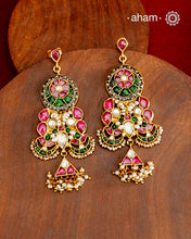Fine Kundan Earrings with delicate work. Crafted in finest 92.5 silver with gold polish and pearls, these are heirloom earrings that can be passed on for generations to come.