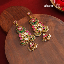 Fine Kundan Earrings with delicate work. Crafted in finest 92.5 silver with gold polish and pearls, these are heirloom earrings that can be passed on for generations to come.