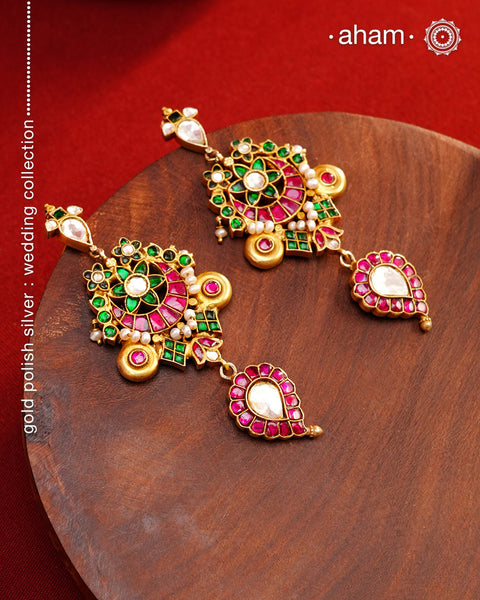 Fine Kundan work Earrings with delicate work. Crafted in finest silver with gold polish, these are heirloom earrings that can be passed on for generations to come.