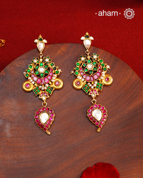 Fine Kundan work Earrings with delicate work. Crafted in finest silver with gold polish, these are heirloom earrings that can be passed on for generations to come.