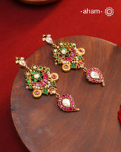 Fine Kundan work Earrings with delicate work. Crafted in finest silver with gold polish, these are heirloom earrings that can be passed on for generations to come.