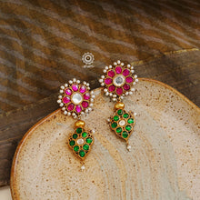 Handcrafted rose quartz silver earrings with gold polish. Lightweight earrings perfect for special occasions and gifting.