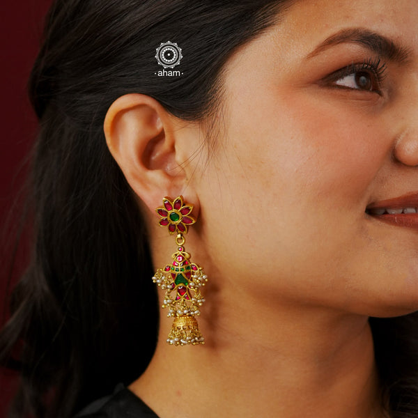 Vibrant gold polish fish jhumkie earrings with little cultured pearls. Handcrafted in 92.5 sterling silver with rani pink & green kundan work. This piece strikes the perfect balance of tradition and new age simplicity. 