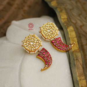 Beautiful and unique tiger call earrings with kundan tops. Crafted in 92.5 silver with gold polish. Make a statement with these stunning earrings. 