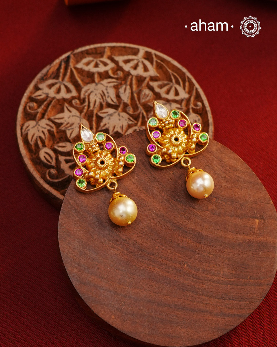 Festive gold polish pearl drop earrings, handcrafted in 92.5 sterling silver with vibrant stone highlights. Lightweight earrings perfect for special occasions and gifting.