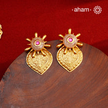 Exude elegance when dressed in these gold polish silver earrings with rose quartz stone. Crafted using traditional techniques in 92.5 sterling silver with intricate floral work. Perfect for intimate weddings and upcoming festive celebrations.