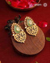 Handcrafted rose quartz silver earrings with gold polish. Lightweight earrings perfect for special occasions and gifting.