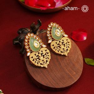 Handcrafted rose quartz silver earrings with gold polish. Lightweight earrings perfect for special occasions and gifting.