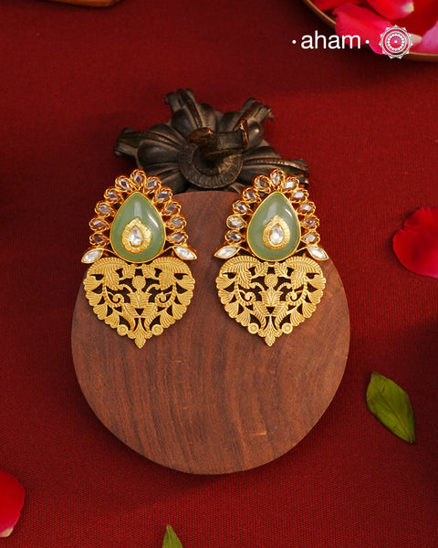 Handcrafted rose quartz silver earrings with gold polish. Lightweight earrings perfect for special occasions and gifting.