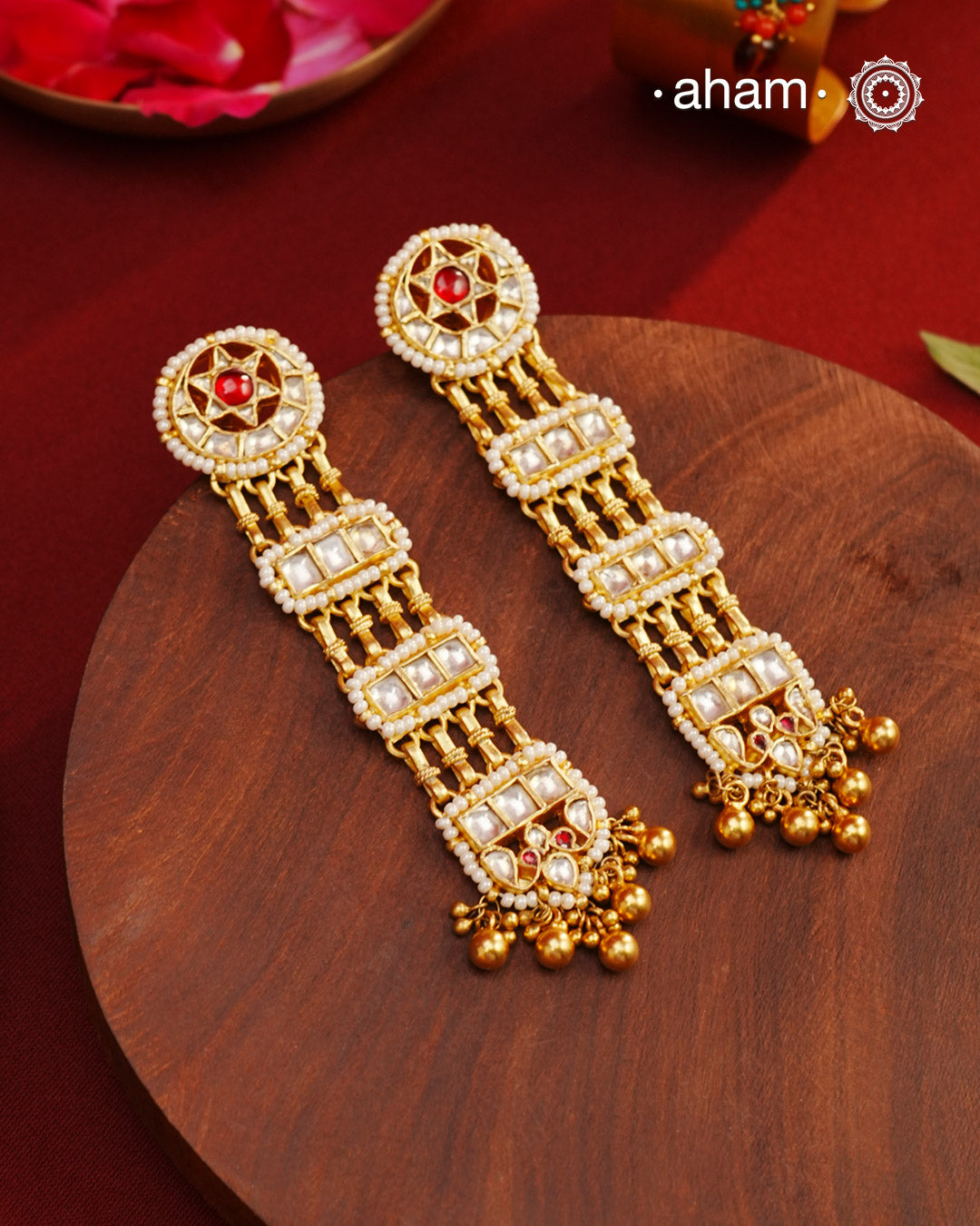 Statement festive kundan earrings handcrafted in 92.5 sterling silver with gold polish and cultured pearls. Perfect for intimate weddings and upcoming festive celebrations.