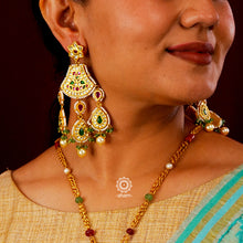 Statement gold polish chandelier earrings with elegant&nbsp;workmanship&nbsp;Handcrafted using traditional techniques in silver with kundan work and laced with&nbsp;pearls. Perfect for intimate weddings and upcoming festive celebrations.