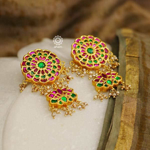 Beautiful lotus kundan earrings handcrafted using traditional techniques in 92.5 silver with kundan work and dangling cultured pearls. Perfect for intimate weddings and upcoming festive celebrations.