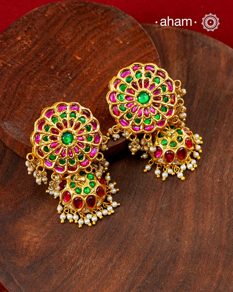 Beautiful lotus kundan jhumkie earrings handcrafted using traditional techniques in 92.5 silver with&nbsp;kundan work and dangling&nbsp;cultured pearls. Perfect for intimate weddings and upcoming festive celebrations.