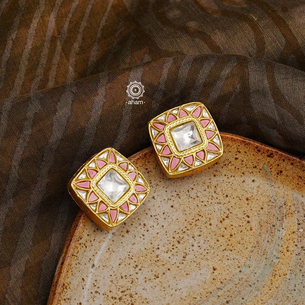These timeless Kundan Pastel Pink Gold Polish Silver Studs are the perfect accessory. Crafted in 92.5% silver with a subtle yet eye-catching dull gold polish, they add a classic and elegant touch to any outfit.