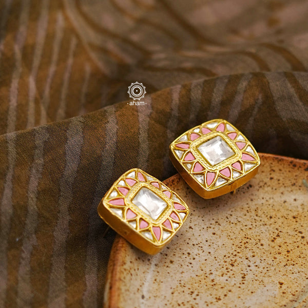 These timeless Kundan Pastel Pink Gold Polish Silver Studs are the perfect accessory. Crafted in 92.5% silver with a subtle yet eye-catching dull gold polish, they add a classic and elegant touch to any outfit.