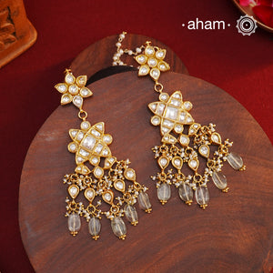 Statement gold polish earring with multiple mini danglers. Handcrafted using traditional methods in 92.5 sterling silver with cultured pearls. Pair these with your ethnic outfits this festive season to ace your look.