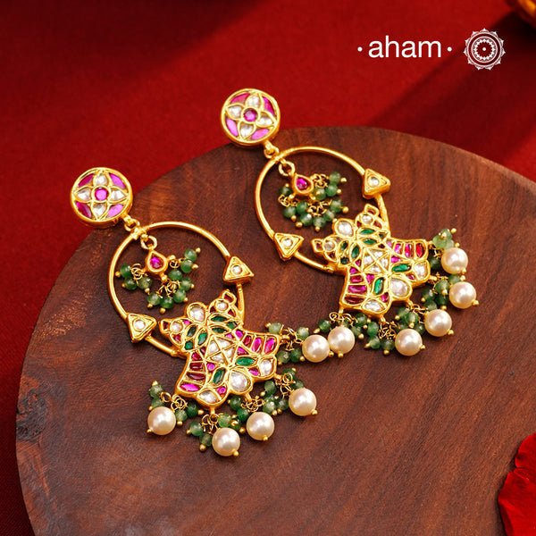Elegant gold polish flower earrings embellished with cultured pearls. Handcrafted in 92.5 sterling silver with rani pink stone setting. Lightweight earrings perfect for special occasions and festivities.