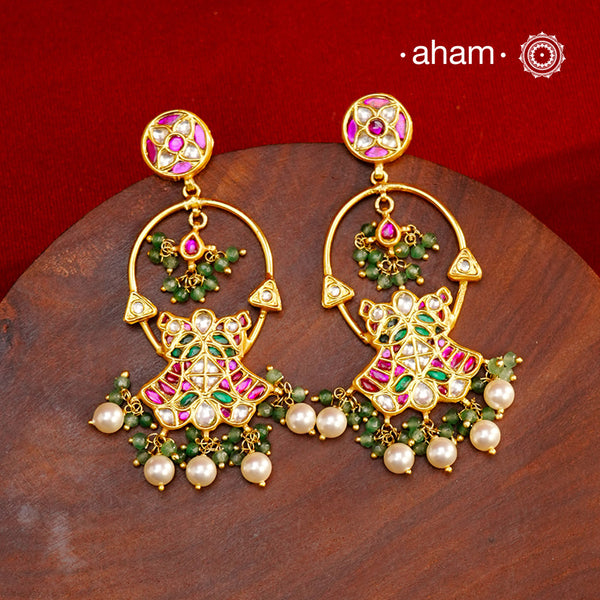 Elegant gold polish flower earrings embellished with cultured pearls. Handcrafted in 92.5 sterling silver with rani pink stone setting. Lightweight earrings perfect for special occasions and festivities.
