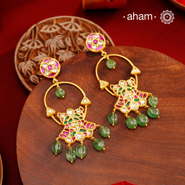 Elegant gold polish flower earrings embellished with cultured pearls. Handcrafted in 92.5 sterling silver with rani pink stone setting. Lightweight earrings perfect for special occasions and festivities.