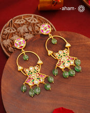 Elegant gold polish flower earrings embellished with cultured pearls. Handcrafted in 92.5 sterling silver with rani pink stone setting. Lightweight earrings perfect for special occasions and festivities.