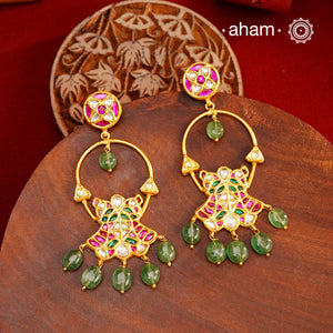 Elegant gold polish flower earrings embellished with cultured pearls. Handcrafted in 92.5 sterling silver with rani pink stone setting. Lightweight earrings perfect for special occasions and festivities.