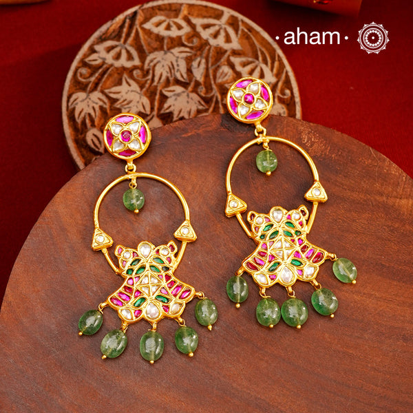Elegant gold polish flower earrings embellished with cultured pearls. Handcrafted in 92.5 sterling silver with rani pink stone setting. Lightweight earrings perfect for special occasions and festivities.