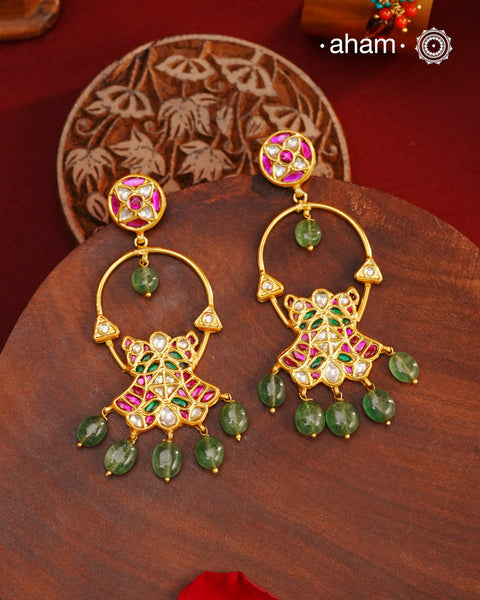 Elegant gold polish flower earrings embellished with cultured pearls. Handcrafted in 92.5 sterling silver with rani pink stone setting. Lightweight earrings perfect for special occasions and festivities.