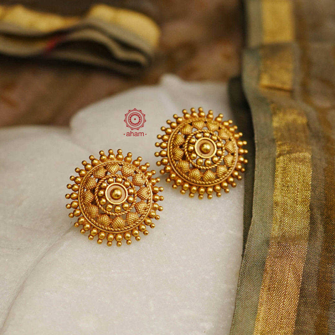Beautiful gold polish studs, handcrafted in 92.5 sterling silver with fine traditional rava work. Lightweight earrings perfect for special occasions. 