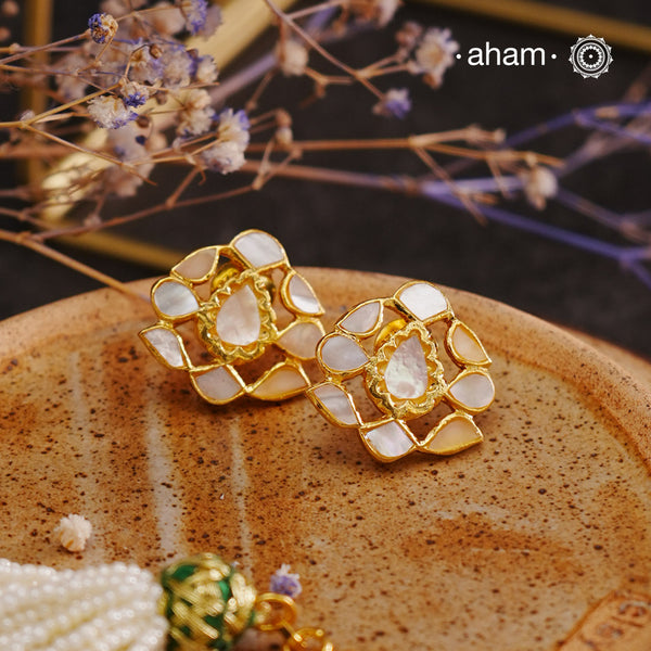 Embrace the allure of timeless elegance with Aham Jewellery’s latest Mother of Pearl collection, a radiant choice for festive celebrations and weddings. Each piece is crafted in 92.5 silver and adorned with a luxurious gold polish, capturing the iridescent beauty of mother of pearl.