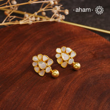 Embrace the allure of timeless elegance with Aham Jewellery’s latest Mother of Pearl collection, a radiant choice for festive celebrations and weddings.
The earrings are crafted in 92.5 silver and adorned with a luxurious gold polis
This collection is designed with festivities, bridesmaids, and destination weddings in mind, offering a versatile blend of tradition and contemporary charm. Ideal for those seeking an ethereal statement, our Mother of Pearl collection brings sophistication to every celebration.