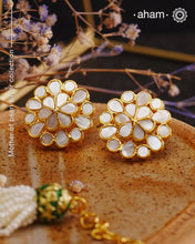 Embrace the allure of timeless elegance with Aham Jewellery’s latest Mother of Pearl collection, a radiant choice for festive celebrations and weddings. Each piece is crafted in 92.5 silver and adorned with a luxurious gold polish, capturing the iridescent beauty of mother of pearl.