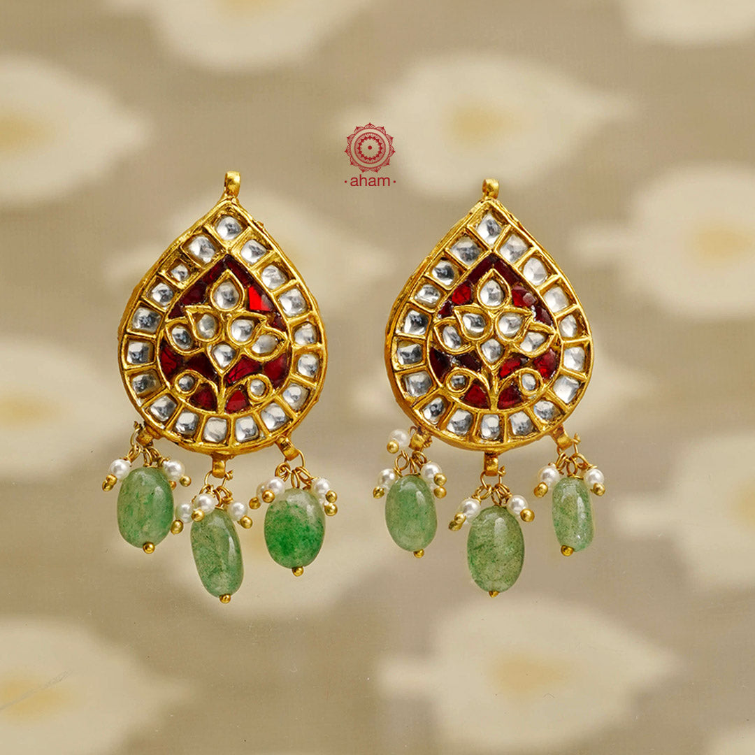 Elegant earrings embellished with fine kundan work. Handcrafted in 92.5 sterling silver and dipped in luxurious gold polish. Perfect for special occasions and festivities.