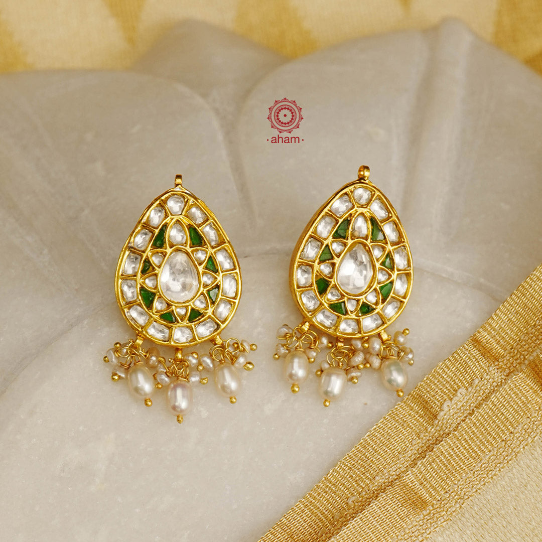 Elegant earrings embellished with fine kundan work. Handcrafted in 92.5 sterling silver and dipped in luxurious gold polish. Perfect for special occasions and festivities.