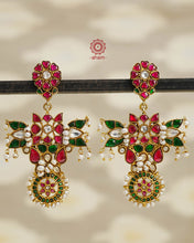 Fine Kundan work Earrings with delicate work. Crafted in finest silver with gold polish and pearls, these are heirloom earrings that can be passed on for generations to come.
