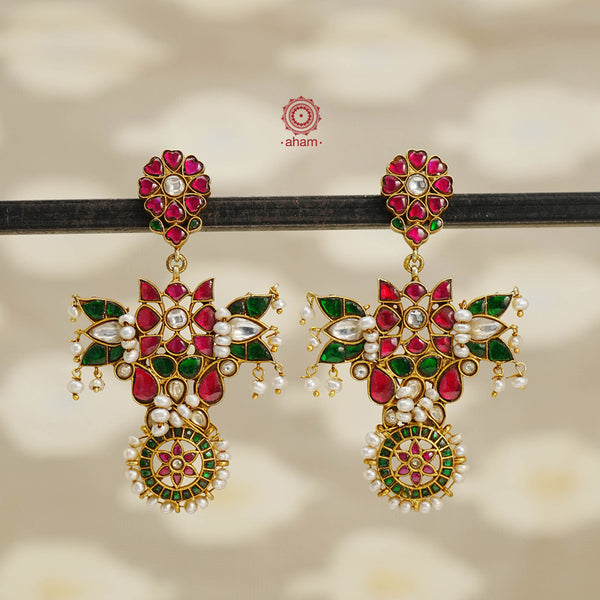 Fine Kundan work Earrings with delicate work. Crafted in finest silver with gold polish and pearls, these are heirloom earrings that can be passed on for generations to come.