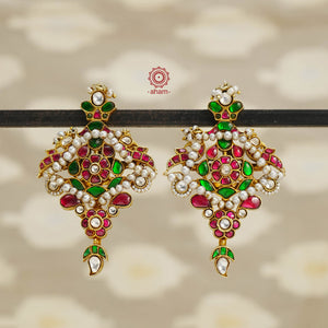 Fine Kundan work Earrings with delicate work. Crafted in finest silver with gold polish and pearls, these are heirloom earrings that can be passed on for generations to come. 