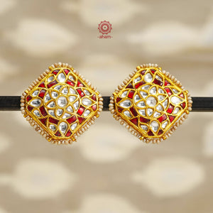 Expertly crafted with intricate kundan work, these festive gold polish studs are made from 92.5 sterling silver using traditional jadau kundan techniques. They make a stunning addition to any ethnic outfit, adding a touch of elegance to special occasions.