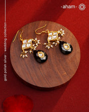 Add a touch of effortless glamour with our Gold Drop Silver Earrings. Crafted with silver and gold polish, these earrings feature little kundan drops with black onyx that can be paired with any outfit for a stress-free and versatile look. Perfect for any occasion