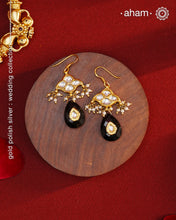 Add a touch of effortless glamour with our Gold Drop Silver Earrings. Crafted with silver and gold polish, these earrings feature little kundan drops with black onyx that can be paired with any outfit for a stress-free and versatile look. Perfect for any occasion