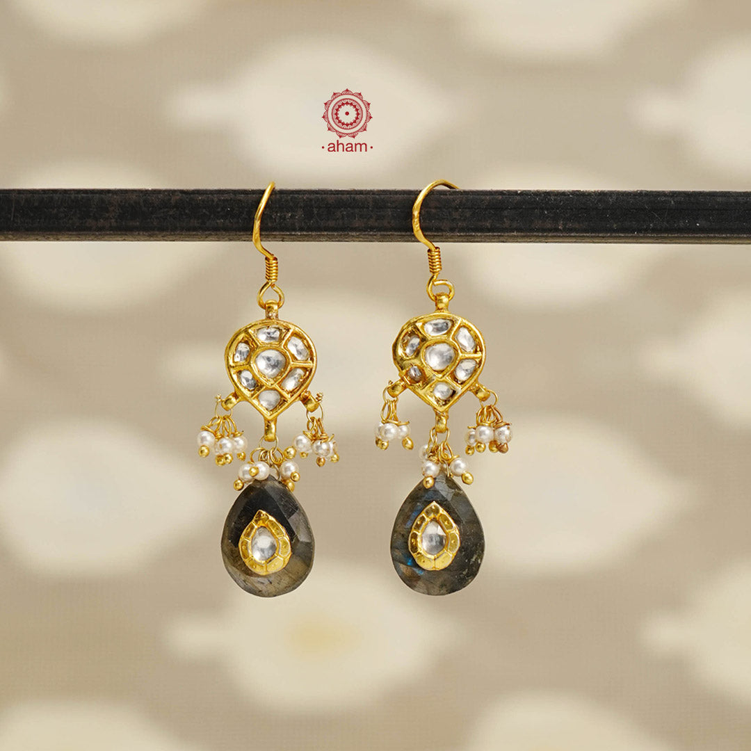 Add a touch of effortless glamour with our Gold Drop Silver Earrings. Crafted with silver and gold polish, these earrings feature little kundan drops that can be paired with any outfit for a stress-free and versatile look. Perfect for any occasion