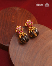 How stunning and versatile are these earrings. Handcrafted in 92.5 sterling silver with gold polish and the right highlights. Perfect for occasions and festivities.