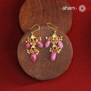 Step up your fashion game with our Gold Polish Silver Earrings! These unique earrings are crafted in lightweight silver with a stunning gold polish and beautiful pearls and pink stones. Easy to wear and effortlessly stylish, you'll love the playful combination of silver and gold. Elevate any outfit with these fun earrings!