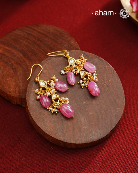 Step up your fashion game with our Gold Polish Silver Earrings! These unique earrings are crafted in lightweight silver with a stunning gold polish and beautiful pearls and pink stones. Easy to wear and effortlessly stylish, you'll love the playful combination of silver and gold. Elevate any outfit with these fun earrings!