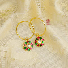 Perfectly crafted gold polish hoops with beautiful little Kundan drops.  Crafted by skilful artisans in 92.5 sterling silver and dipped in gold polish.  Playful, light and such a breeze to wear.  Great budget buys that you can gift your loved ones this festive season or as wedding favours, a versatile gifting option. 