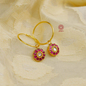 Perfectly crafted gold polish hoops with beautiful little Kundan drops.  Crafted by skilful artisans in 92.5 sterling silver and dipped in gold polish.  Playful, light and such a breeze to wear.  Great budget buys that you can gift your loved ones this festive season or as wedding favours, a versatile gifting option. 