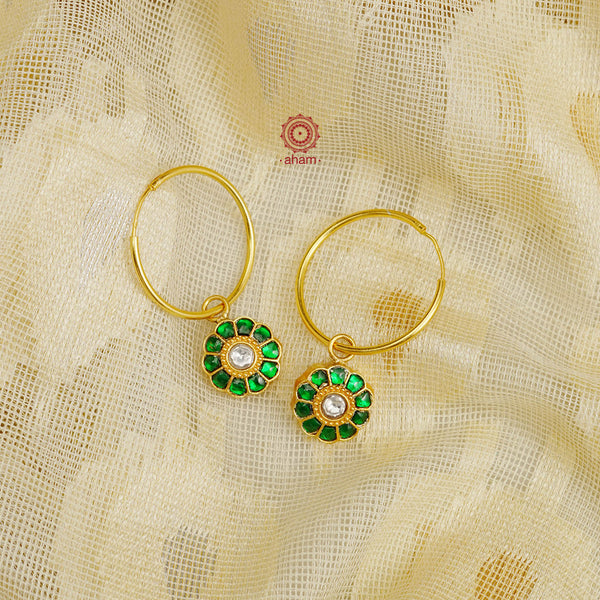 Perfectly crafted gold polish hoops with beautiful little Kundan drops.  Crafted by skilful artisans in 92.5 sterling silver and dipped in gold polish.  Playful, light and such a breeze to wear.  Great budget buys that you can gift your loved ones this festive season or as wedding favours, a versatile gifting option. 