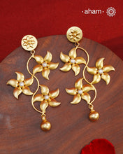 These Gold Polish Silver Earrings are a fun and versatile addition to any jewelry collection. With a light weight and delicate flower design, they can effortlessly be worn to work or for a night out. Crafted in 92.5 silver with a stunning gold polish, these earrings are both elegant and durable. Elevate any outfit with these beautiful earrings.