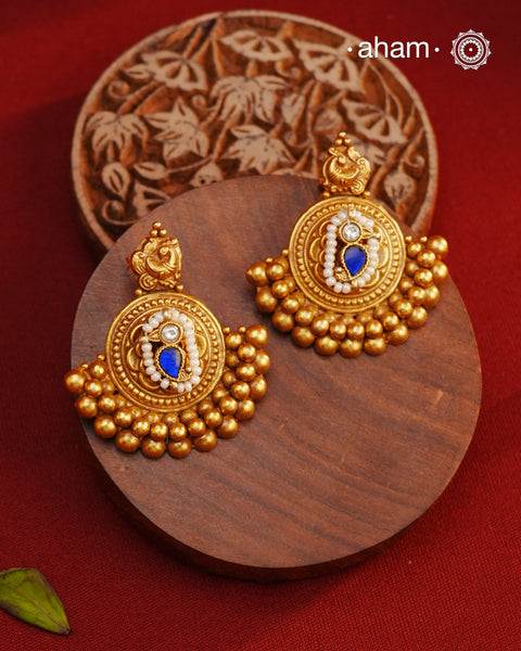 These beautiful Festive Gold Polish Silver Earrings are expertly handcrafted in 92.5 silver and plated in a stunning dull gold finish. Perfect for adding a touch of elegance to any festive occasion, these earrings are a must-have for any jewelry collection.