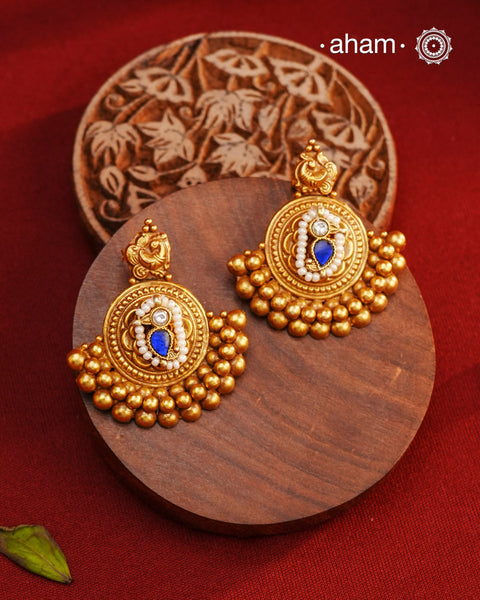 These beautiful Festive Gold Polish Silver Earrings are expertly handcrafted in 92.5 silver and plated in a stunning dull gold finish. Perfect for adding a touch of elegance to any festive occasion, these earrings are a must-have for any jewelry collection.