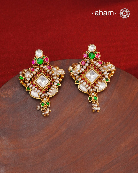 Fine Kundan Earrings with delicate work. Crafted in finest 92.5 silver with gold polish and pearls, these are heirloom earrings that can be passed on for generations to come.&nbsp;